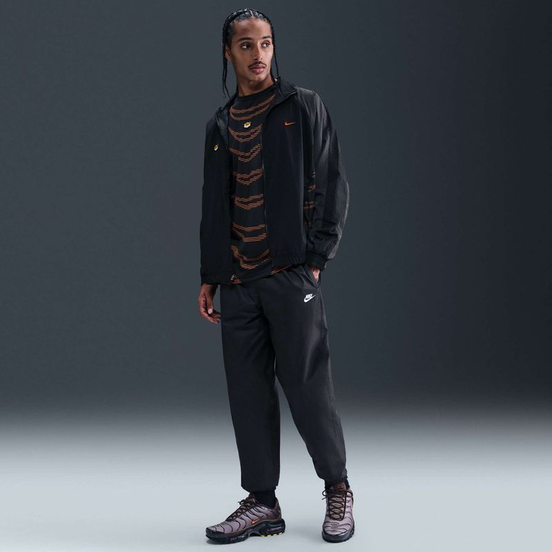 Pantaloni uomo Nike Windrunner Lined black/white 7