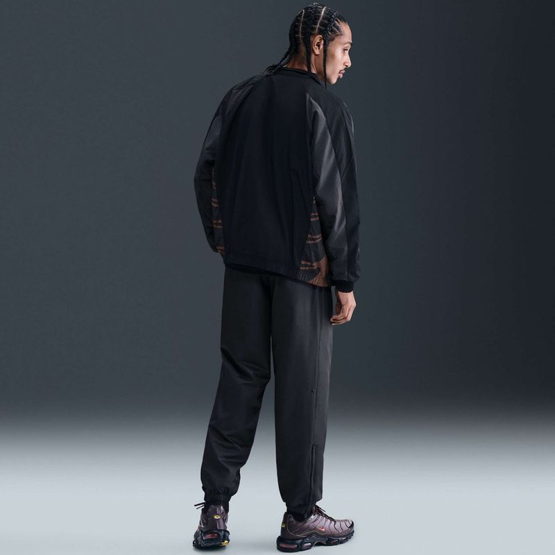 Pantaloni uomo Nike Windrunner Lined black/white 8